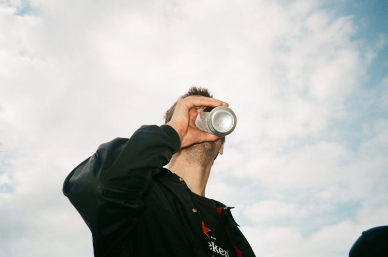 Coors light pride can - Man drinking can